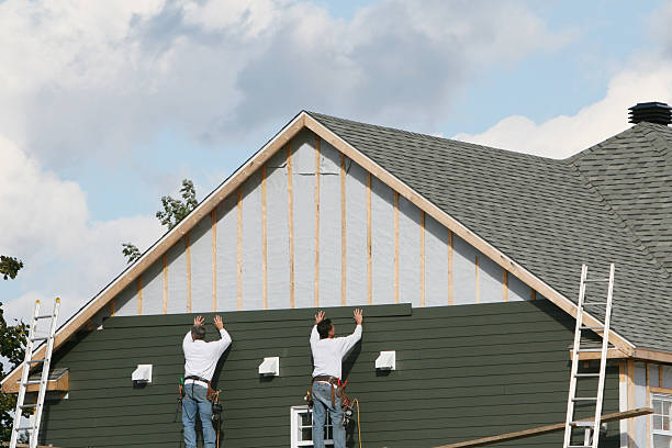 Professional Storm Damage Siding Repair technician working in Sophia, NC